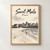 Saint-Malo ramparts from the beach full-bleed print styled in Front oak frame - corrected opening; frame and props not included