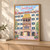 Innsbruck Golden Roof full-bleed print styled in Light oak-console; frame and props not included