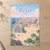 Port Said city view full-bleed print styled in Unframed sheet - corrected A-series; frame and props not included