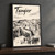 Tangier city view full-bleed print styled in Black frame / charcoal wall; frame and props not included