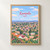 Kampala city view full-bleed print styled in Front oak frame - corrected opening; frame and props not included