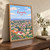 Kampala city view full-bleed print styled in Original angled oak-console; frame and props not included