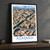 Asmara city view bordered print styled in Black frame / charcoal wall; frame and props not included