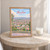 Morelia city view full-bleed print styled in Oak frame / bedside table; frame and props not included
