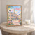 Riga city view full-bleed print styled in Oak frame / bedside table; frame and props not included