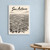 San Antonio city view full-bleed print styled in White frame / blue sitting room; frame and props not included