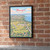 Managua city view full-bleed print styled in Black frame / exposed brick; frame and props not included