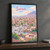 Sanaa city view full-bleed print styled in Black frame / charcoal wall; frame and props not included