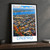 Dnipro city view bordered print styled in Black frame / charcoal wall; frame and props not included