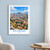 Athens city view bordered print styled in White frame / blue sitting room; frame and props not included