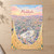 Makkah city view full-bleed print styled in Unframed sheet - corrected A-series; frame and props not included