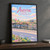 Aurora city view full-bleed print styled in Black frame / charcoal wall; frame and props not included