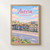 Aurora city view full-bleed print styled in Front oak frame - corrected opening; frame and props not included