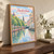 Amsterdam city view full-bleed print styled in Original angled oak-console; frame and props not included