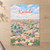 Karbala city view full-bleed print styled in Unframed sheet - corrected A-series; frame and props not included