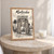 Montevideo city view full-bleed print styled in Oak frame / bedside table; frame and props not included