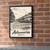 Antananarivo city view full-bleed print styled in Black frame / exposed brick; frame and props not included
