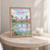 Nairobi city view full-bleed print styled in Oak frame / bedside table; frame and props not included