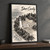Cana Island Lighthouse full-bleed print styled in Black frame / charcoal wall; frame and props not included