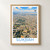 Sukrah city view bordered print styled in Front oak frame - corrected opening; frame and props not included