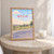 Wah Cantt city view full-bleed print styled in Oak frame / bedside table; frame and props not included