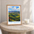 Los Teques city view bordered print styled in Oak frame / bedside table; frame and props not included