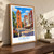 Elbląg city view bordered print styled in Original angled oak-console; frame and props not included