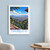 Taunggyi city view bordered print styled in White frame / blue sitting room; frame and props not included