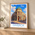Oaxaca city view bordered print styled in Light oak-console; frame and props not included