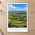 Yamoussoukro city view bordered print styled in Unframed sheet - corrected A-series; frame and props not included