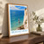 Beachy Head lighthouse from clifftop bordered print styled in Original angled oak-console; frame and props not included