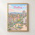 Pristina city view full-bleed print styled in Front oak frame - corrected opening; frame and props not included