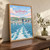 Wellington city view full-bleed print styled in Original angled oak-console; frame and props not included