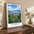 Ambon city view bordered print styled in Original angled oak-console; frame and props not included