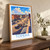 Topeka city view bordered print styled in Original angled oak-console; frame and props not included