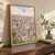 Ibb city view full-bleed print styled in Original angled oak-console; frame and props not included