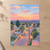 Jijiga city view full-bleed print styled in Unframed sheet - corrected A-series; frame and props not included