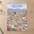 Ensenada city view full-bleed print styled in Unframed sheet - corrected A-series; frame and props not included