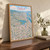 Oakland city view full-bleed print styled in Original angled oak-console; frame and props not included