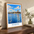 Aswān city view bordered print styled in Original angled oak-console; frame and props not included