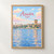 Aswān city view full-bleed print styled in Front oak frame - corrected opening; frame and props not included