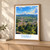 Danlí city view bordered print styled in Light oak-console; frame and props not included