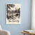 Central Park Bow Bridge full-bleed print styled in White frame / blue sitting room; frame and props not included