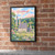 Glendalough round tower and monastery full-bleed print styled in Black frame / exposed brick; frame and props not included