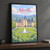 Asheville Biltmore House front lawn full-bleed print styled in Black frame / charcoal wall; frame and props not included