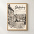 Gold Hill cobbles full-bleed print styled in Front oak frame - corrected opening; frame and props not included