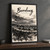 Bandung city view full-bleed print styled in Black frame / charcoal wall; frame and props not included