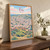 Fes city view full-bleed print styled in Original angled oak-console; frame and props not included