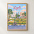 Kigali city view full-bleed print styled in Front oak frame - corrected opening; frame and props not included