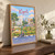 Kigali city view full-bleed print styled in Original angled oak-console; frame and props not included